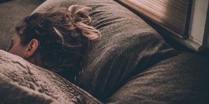 Woman sleeping night skin repair circadian biology